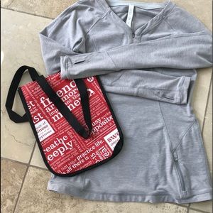 Gray zip lululemon top.
